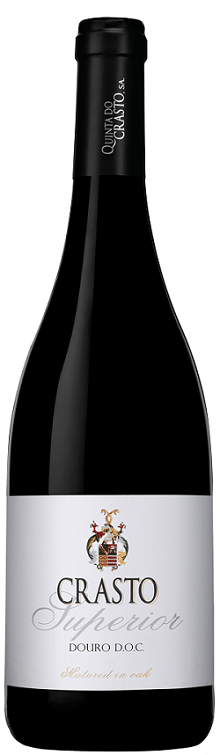 Taça de vinho tinto Crasto Superior da Quinta do Crasto, com garrafa de vinho tinto na imagem.