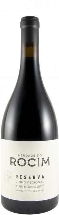 Taça de vinho tinto Herdade do Rocim Reserva, garrafa de vinho da marca Rocim, com rótulo e taça ao fundo.
