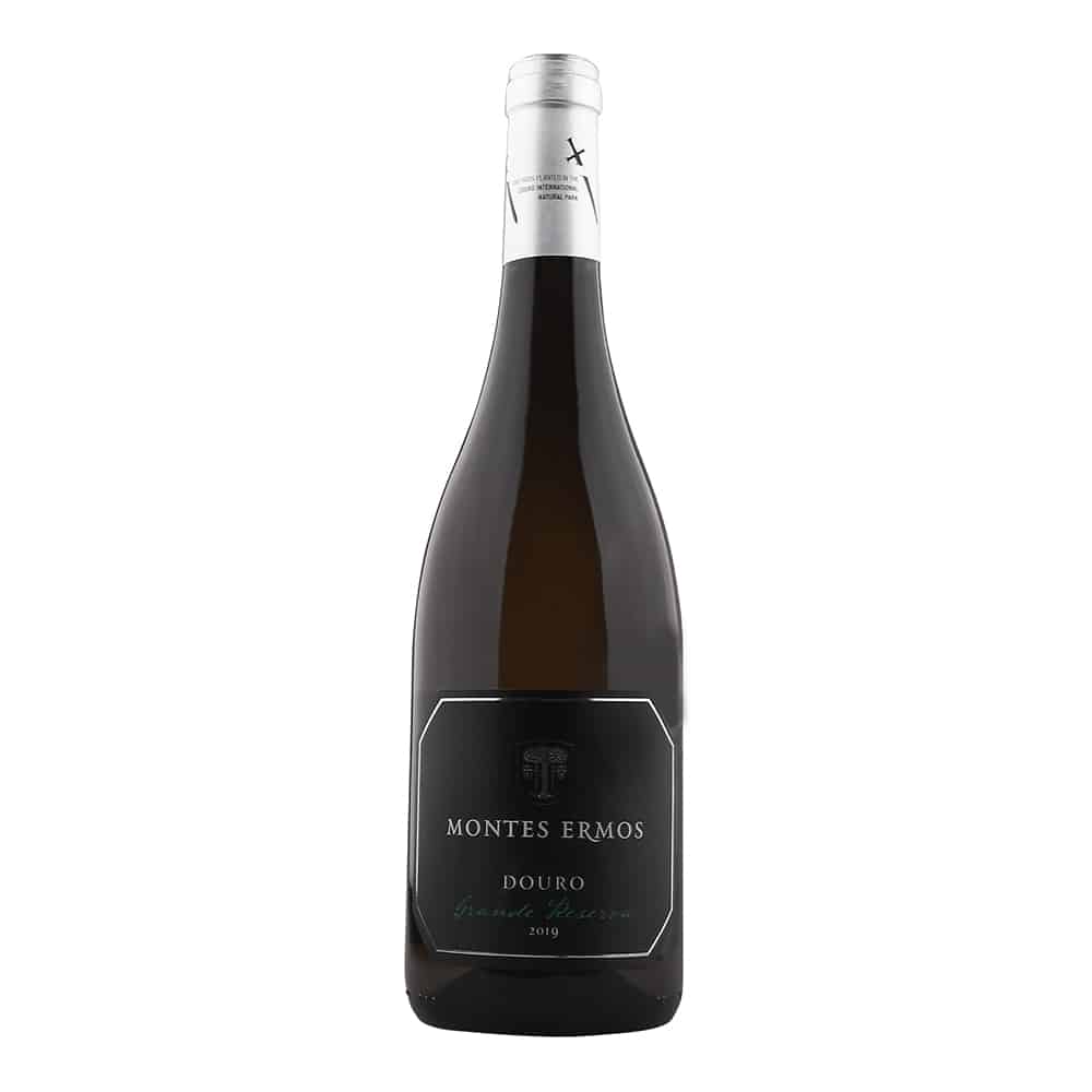 Vinho branco Montes Ermos Grande Reserva 2019 da Adega Cooperativa de Freixo de Espada à Cinta, garrafa com rótulo elegante.