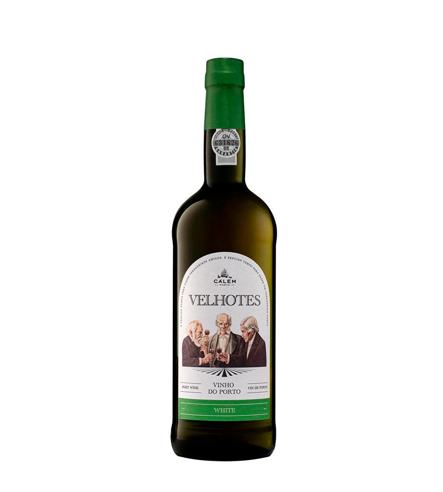 Taça de vinho do Porto Velhotes Branco da Sogevinus, com vinho dourado e textura sedosa, em close-up.