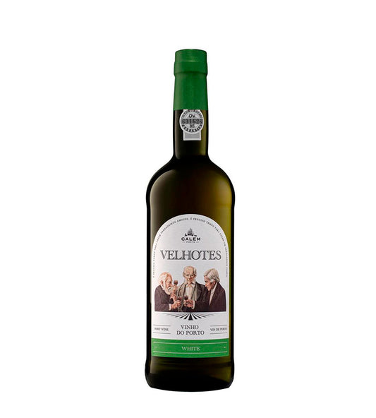 Taça de vinho do Porto Velhotes Branco da Sogevinus, com vinho dourado e textura sedosa, em close-up.