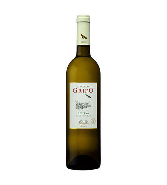 Taça de vinho branco Terras do Grifo Reserva Branco da marca Rozès, SA, em uma mesa elegante.