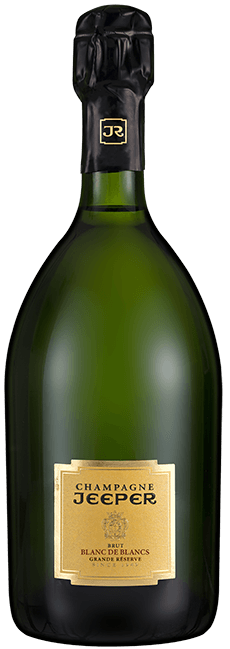 Taça de champagne Jeeper Blanc Grand Reserve, com garrafa de Jeeper Blanc Blanc Brut na imagem.