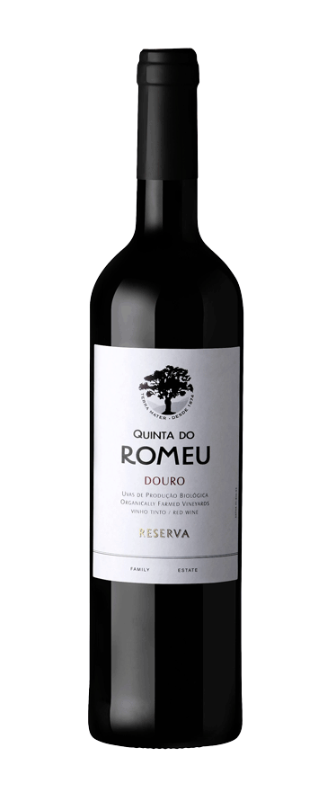 Taça de vinho tinto Quinta do Romeu Reserva Tinto 2020, vinho encorpado e elegante, em taça de cristal.