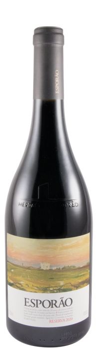 Taça de vinho tinto Herdade do Esporão, garrafa de vinho Herdade do Esporão Tinto em uma mesa elegante.