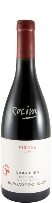Taça de vinho tinto Herdade do Rocim Tinto, garrafa de vinho da marca Rocim, com rótulo colorido e elegante.