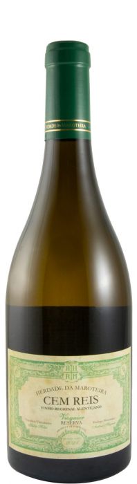 Taça de vinho branco Cem Reis, da marca Herdade da Maroteira, com garrafa de vinho branco ao fundo, em ambiente elegante.