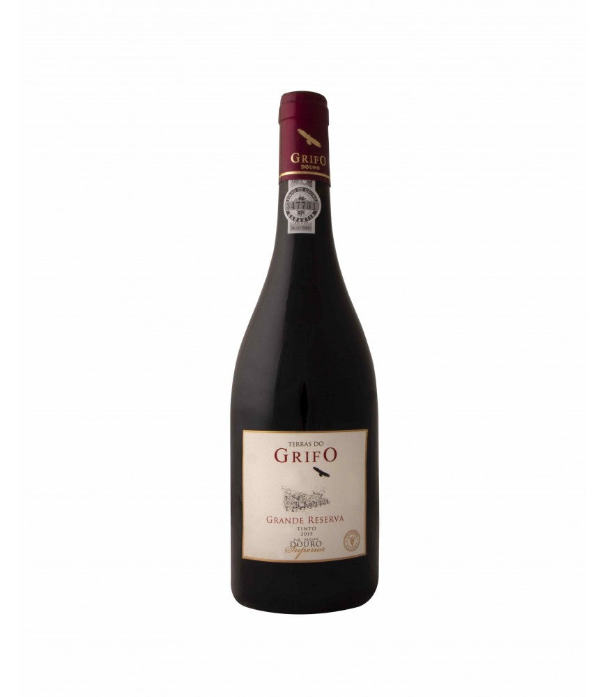 Taça de vinho tinto Grande Reserva Tinto da marca Grifo, com rótulo e garrafa visíveis em fundo neutro.