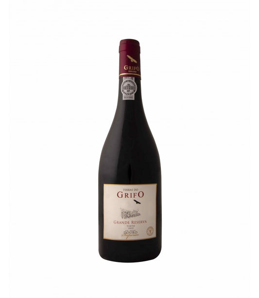 Taça de vinho tinto Grande Reserva Tinto da marca Grifo, com rótulo e garrafa visíveis em fundo neutro.