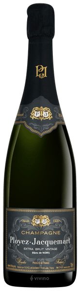Taça de Champagne Ployez-Jacquemart Vintage Blanc de Noir com garrafa de Champagne ao fundo, vista elegante e refinada.