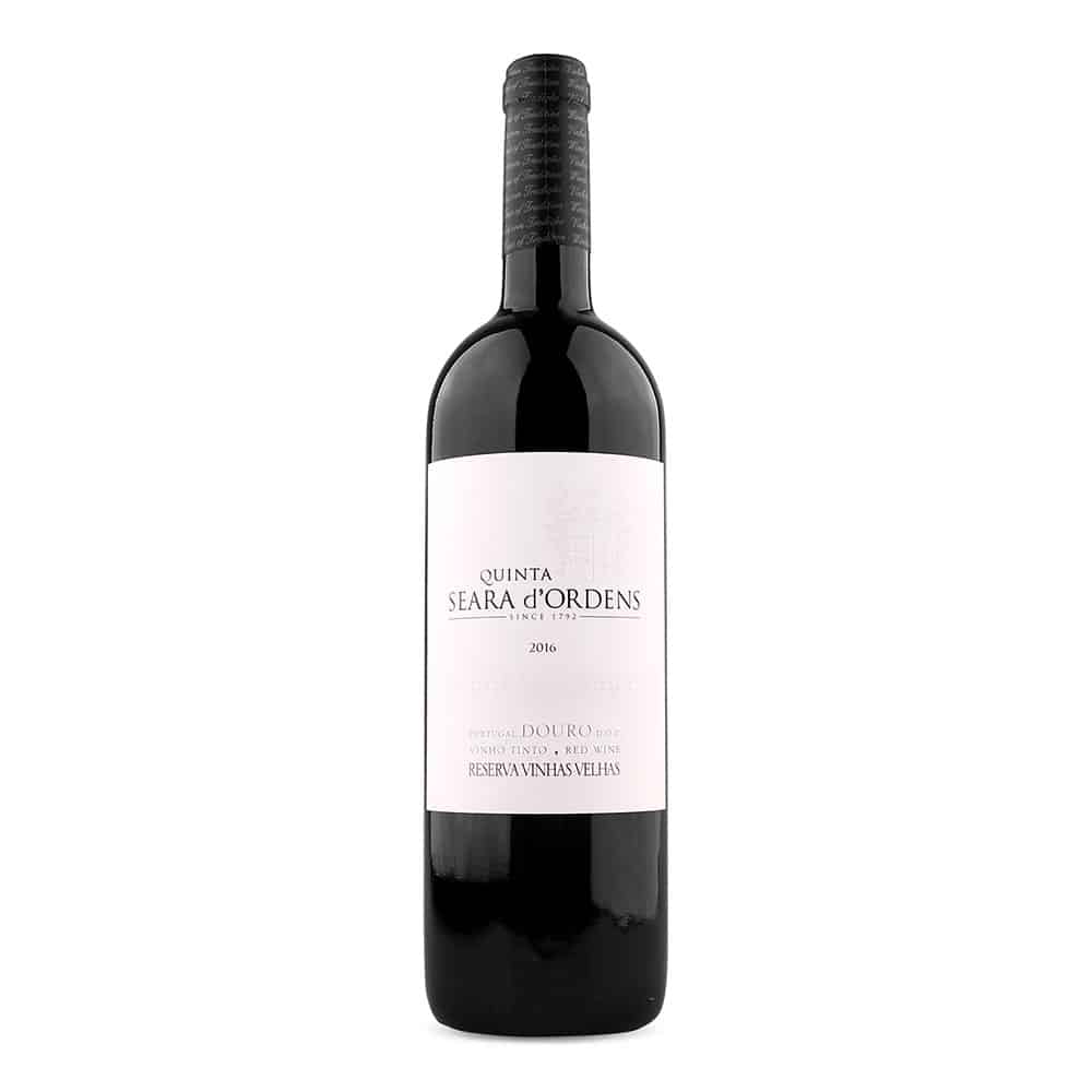 Vinho Quinta Seara D'Ordens Vinhas Velhas, safra 2016, em garrafa com rótulo elegante, destaque para reserva de vinhos portugueses.